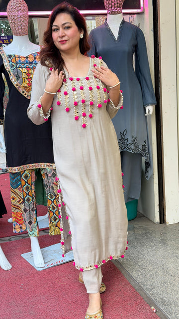 Ivory Hand-Embellished Kurta Set with Pink Tassel Detailing